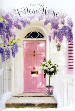 In this Herne Hill doorway scene, a story of new beginnings is told through colour, texture, and the gentle fall of flowers. A pale pink front door, its paint smooth and inviting, stands set within whitewashed walls that catch and soften the natural light. Overhead, wisteria cascades in generous drapes of lavender and lilac, their blossoms hanging in loosely gathered clusters that brush the top of the frame and trail towards the threshold. The vines curve and twist in a relaxed, organic way, much like the greenery that climbs the fronts of the townhouses near Herne Hill station or around the quieter streets leading towards Dulwich. A single floral arrangement sits on the doorstep in a grey metal bucket, simple yet chic. It is filled to the brim with creamy white roses, each bloom plush and full, their petals unfolding in soft, rounded layers. Between the roses, fresh green foliage peeks out, adding lightness and a garden-fresh feel. A soft pink ribbon is tied neatly around the bucket, its bow a small but thoughtful flourish that mirrors the tones of the door and shutter. Dappled light filters through the wisteria, laying soft patterns across the petals and the stone step, lending the whole image a sense of calm, late-afternoon stillness. The composition feels intimate and welcoming, like a quiet moment just before guests arrive for a housewarming gathering. It's the kind of carefully styled entrance a local florist might create to welcome someone home in Herne Hill, marking the start of a new chapter with flowers that feel both stylish and sincerely heartfelt.