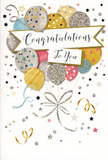 The congratulations card displayed here exudes an air of joyful refinement, as though it were designed for those special moments of achievement that people around Herne Hill love to celebrate with both warmth and style. The focal point is a bouquet-like cluster of balloons rising from the bottom of the card, gathered in a soft, rounded shape that feels full yet airy. The balloons appear in harmonising shades of metallic gold, silver, champagne, powder blue, gentle pink, and light grey, their surfaces glinting with accents of tiny stars, slim stripes, and patches of fine glitter. These decorative details suggest texture you can almost feel, like the raised ink on a luxury card or the gentle grain of glitter under your fingertips. Slender ribbons trail from each balloon, twisting in fluid lines of gold and silver that sweep gracefully across the design, much like flowing stems or trailing greenery in a well-composed floral display. The background is clean and pale, speckled with delicate stars and looping swirls that echo the light-hearted energy of a celebration near Brockwell Park or along Milkwood Road. A softly curved banner drifts across the centre of the balloon bouquet, carrying the message Congratulations To You in elegant, flowing script that radiates sincerity and quiet admiration. The overall mood is festive but not overwhelming, blending sparkle with restraint to create a card suitable for graduations, promotions, exam success, or any personal triumph. Imagining it nestled alongside freshly delivered flowers in a Herne Hill home, you can almost sense the smile it is meant to bring-the gentle affirmation that someone's hard work and dedication have truly been noticed and cherished.